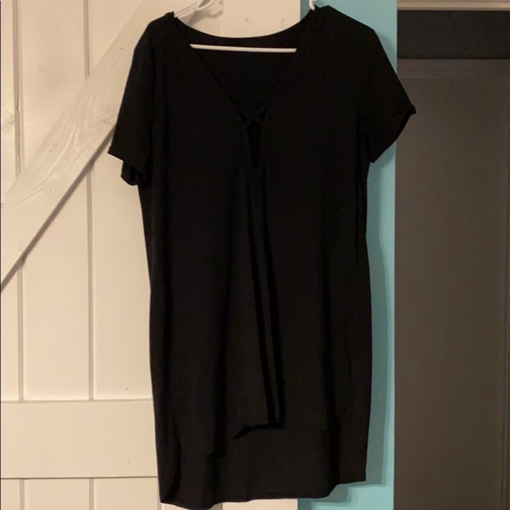 Low cut black dress with short sleeves